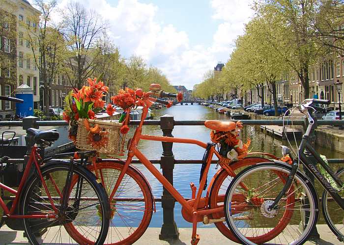 Orange bike in Amsterdam (Photo: Envato)