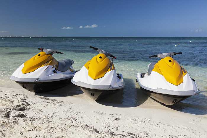 Jet skis on the beach at Passover programs. 