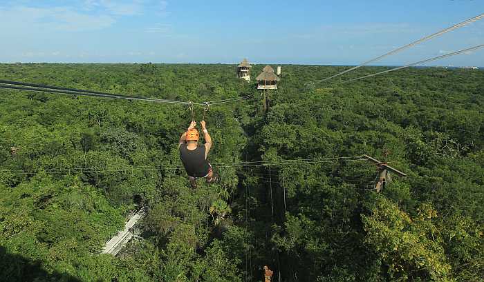 zip lining at adventure theme park in Cancun.