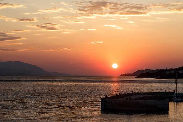 Sunset in Loutraki, Greece. 