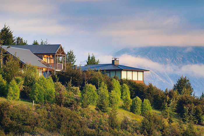 Boutique countryside hotel surrounded by mountains and nature, reflecting the trend toward quiet, off-the-beaten-path kosher travel