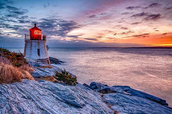Sunset at Castle Hill lighthouse in Newport Rhode Island.