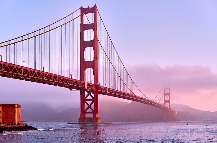 Golden Gate Bridge in San Francisco at sunrise.